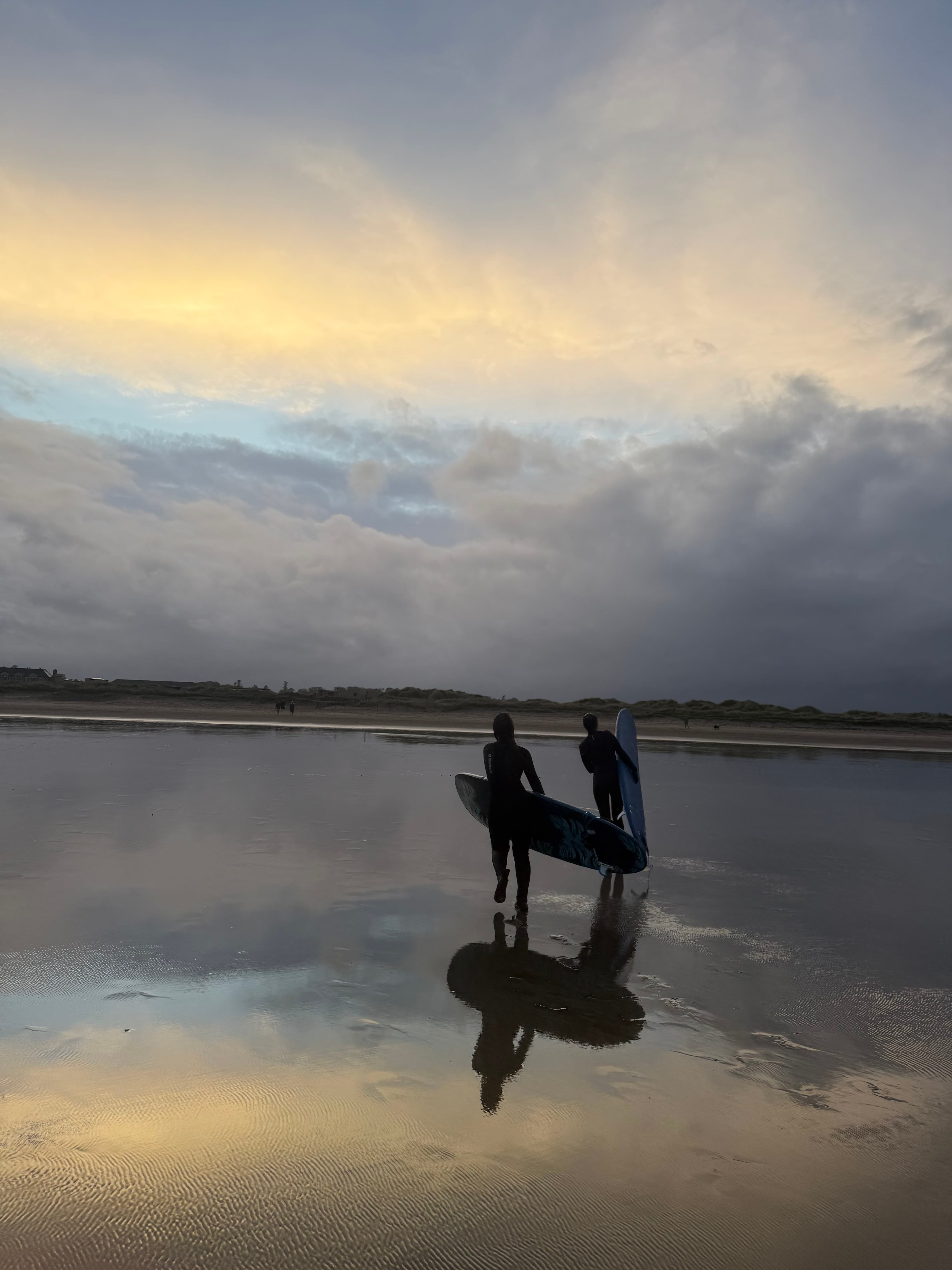 Surf club members on the beach